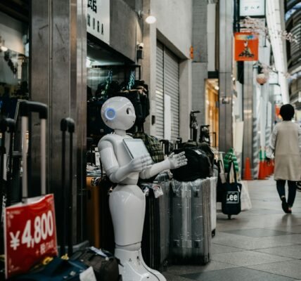 robot standing near luggage bags