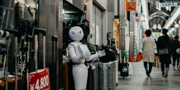 robot standing near luggage bags